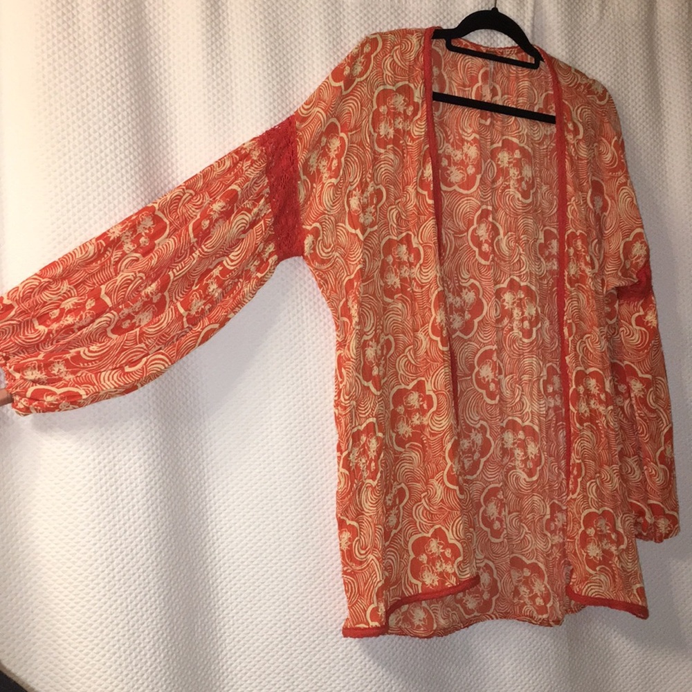 FREE PEOPLE floral throw over blouse style